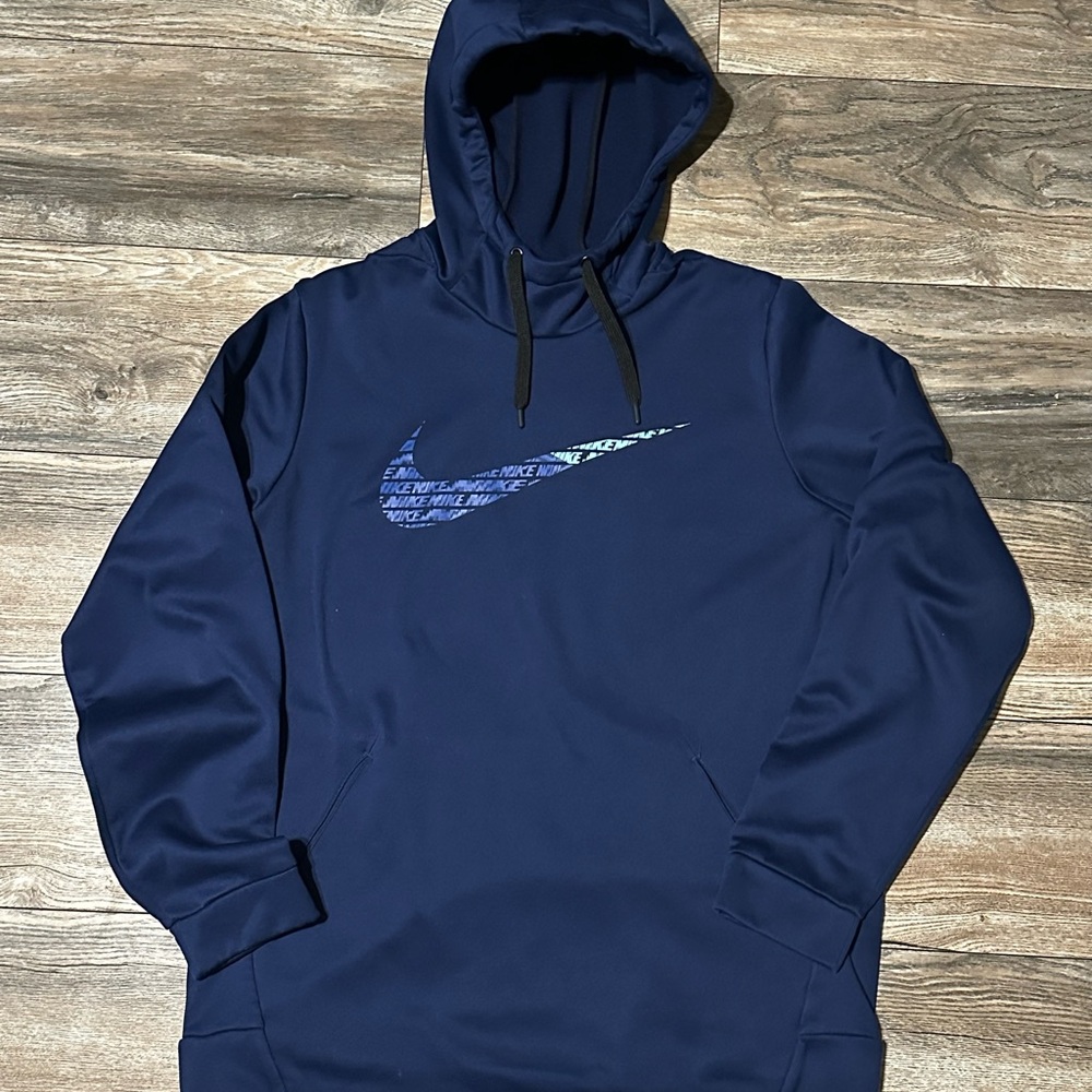 Nike Dri-Fit Therma Fleece Pullover Hoodie In Blue with A Large Logo